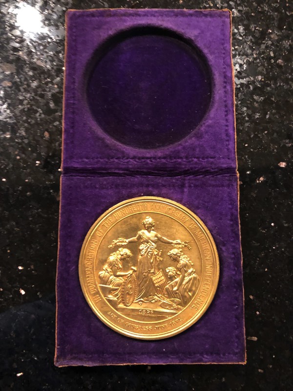 Original felt lined presentation box shown in open position with medal